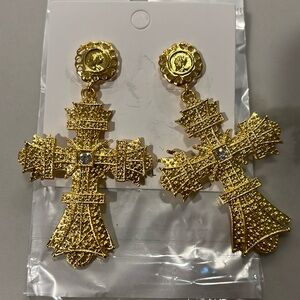 New never worn gold colored cross earrings
